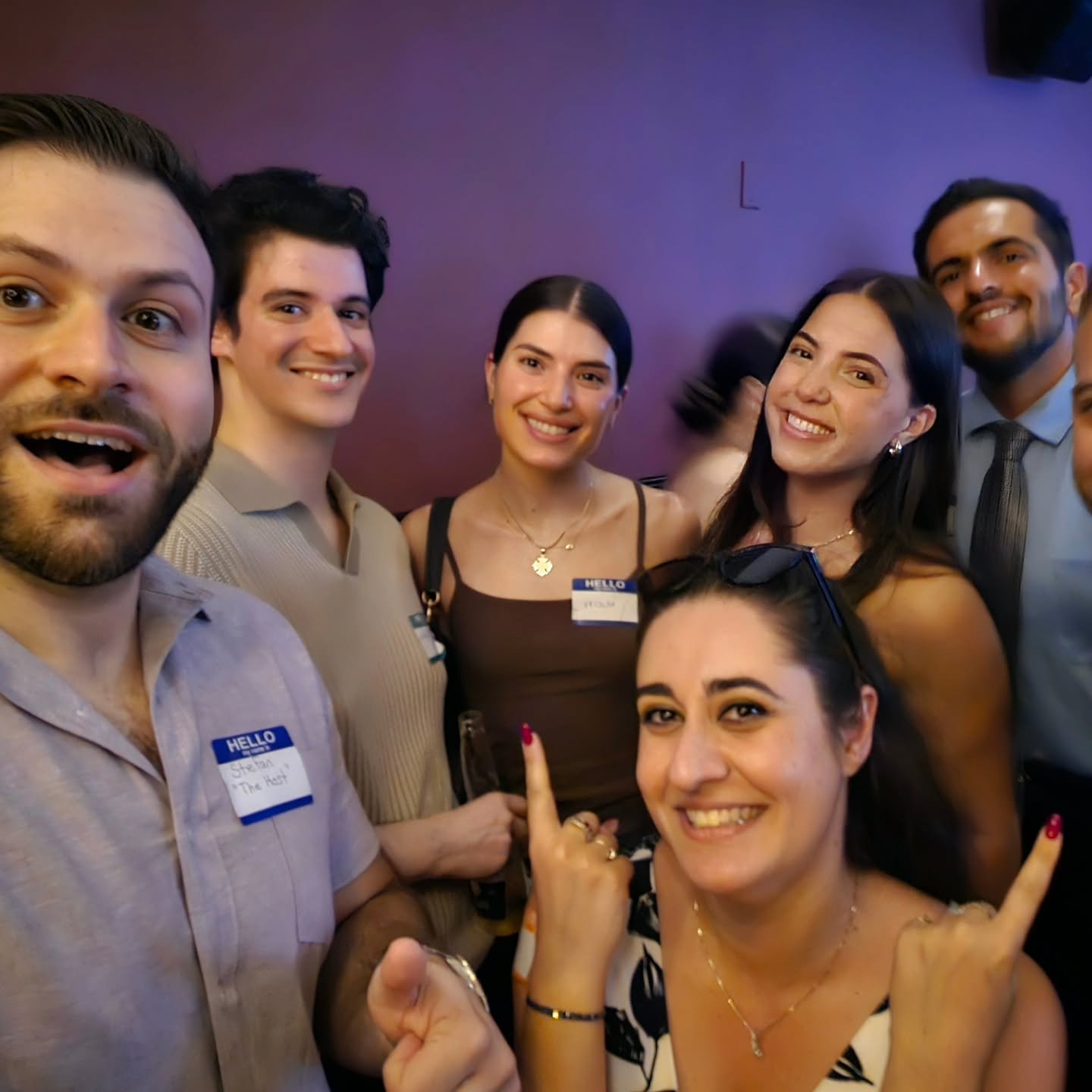 A smiling group of friends at Astoria Connect